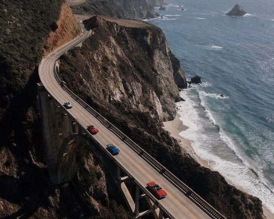 classic cars on highway one