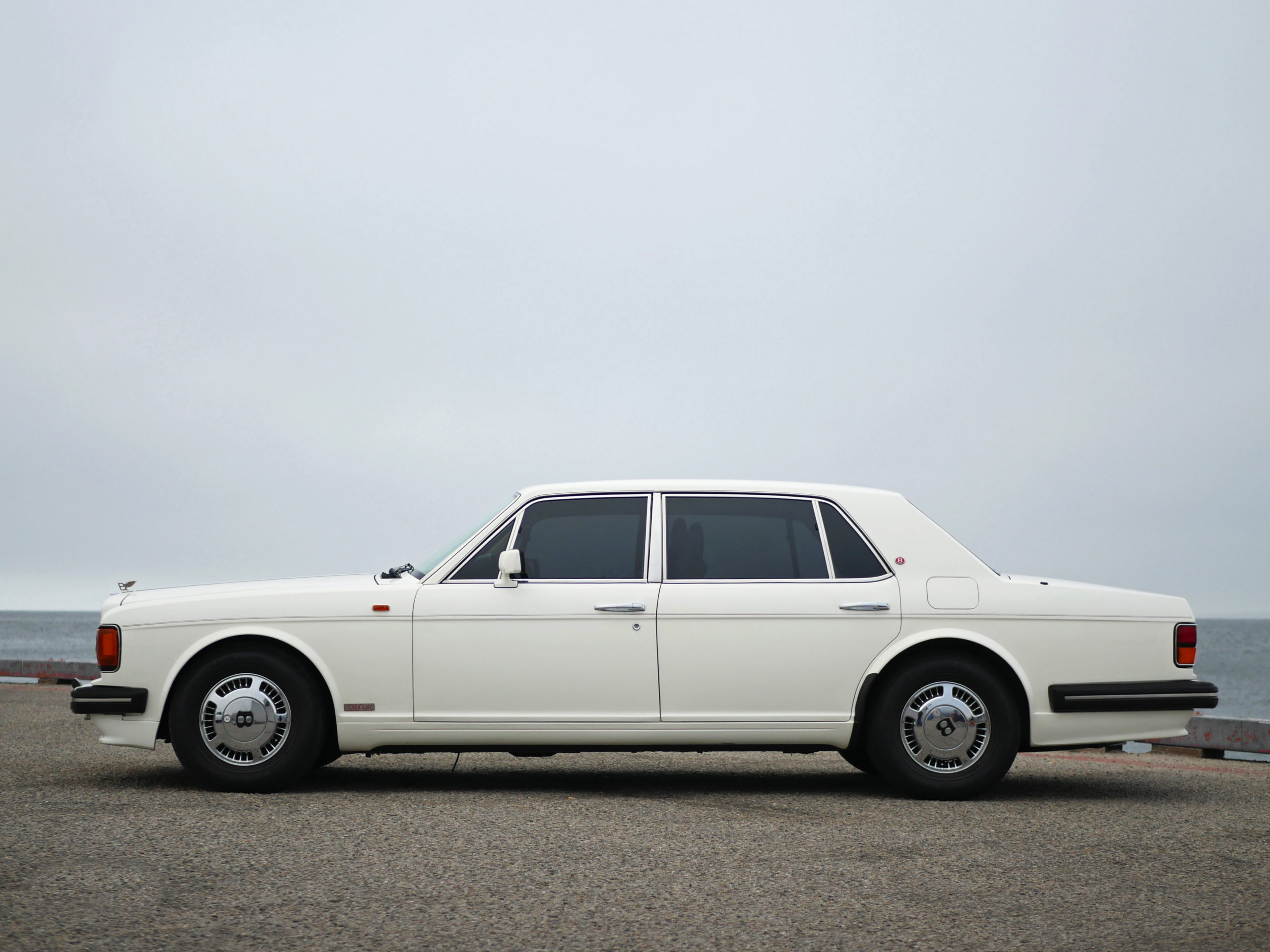 classic-bentley-sedan-white-a-monterey-touring-vehicles