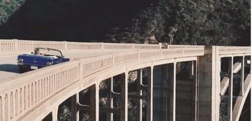 convertible mustang on bridge in Monterey