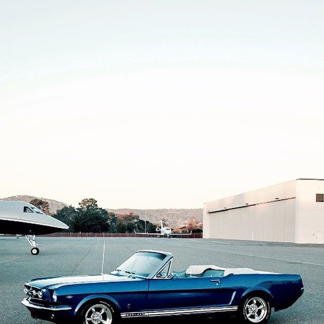 blue mustang parked