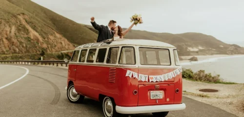 bride and groom in vintage vw van